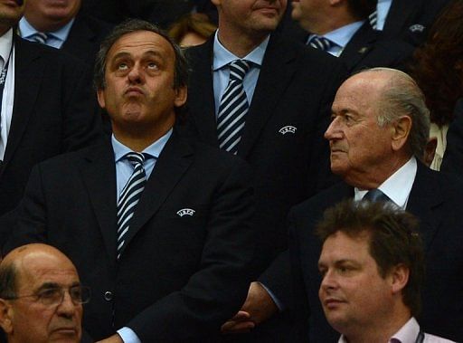 Michael Platini (left) suggests staging the European championships across 12 or 13 cities