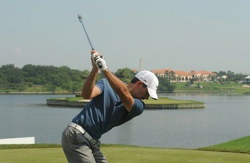 The 2011 Masters champion hit seven birdies in steamy conditions at the Amata Spring course
