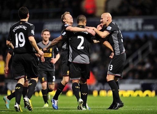 Liverpool&#039;s Glen Johnson (2nd R) celebrates scoring with Jonjo Shelvey (R) and Lucas Leiva (3rd R)