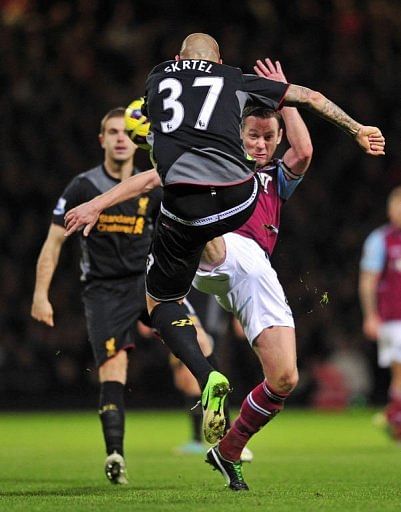 Liverpool fight back to sink Hammers