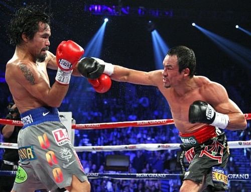 Manny Pacquiao (L) and Juan Manuel Marquez