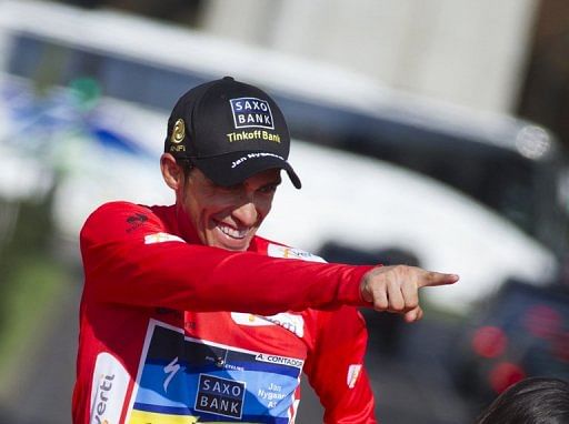 Alberto Contador celebrates on the podium at the Vuelta cycling Tour of Spain in Madrid, in September 2012