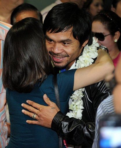 Manny Pacquiao remains a sporting icon in the Philippines despite a second defeat on the trot