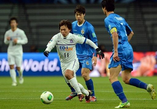 Hisato Sato (centre) scored twice as Hiroshima beat Ulsan Hyundai in the Club World Cup today