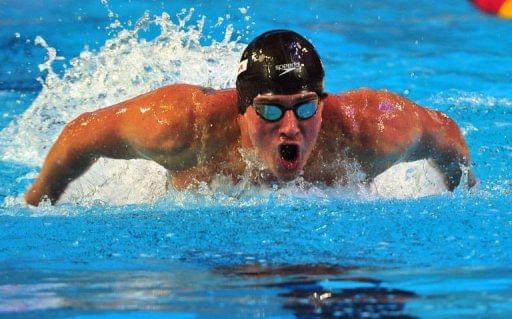 Lochte strikes double gold