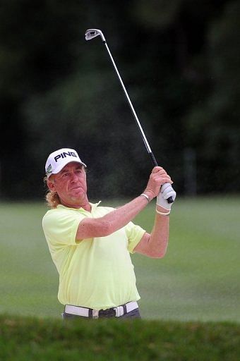 Miguel Angel Jimenez of Spain plays a shot out of a bunker at the UBS Hong Kong Open on November 17, 2012