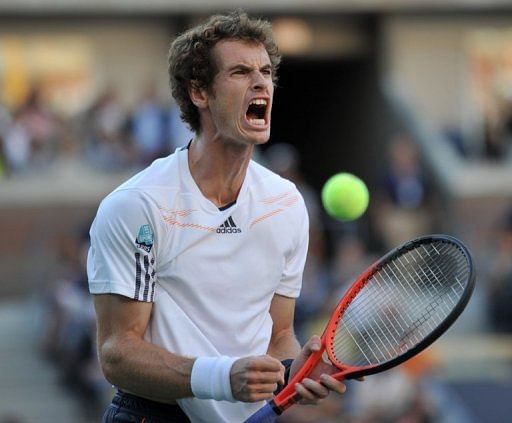 Andy Murray celebrates victory in the first set against Novak Djokovic in the final at the US Open on September 10, 2012