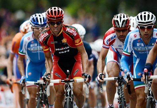 Alberto Contador (in red) rides in the Road Race World Championships on September 23, 2012 in Valkenburg, Netherlands