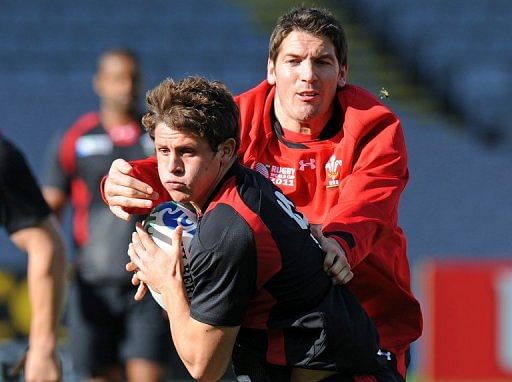 Wales&#039; Lloyd Williams (L) and James Hook take part in the Captain&#039;s Run in Auckland on October 20, 2011