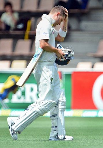 Australia&#039;s batsman Michael Clarke reacts after been dismissed by Sri Lanka, in Hobart, on December 15, 2012
