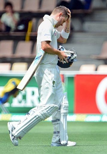 Australia&#039;s batsman Michael Clarke reacts after been dismissed by Sri Lanka, in Hobart, on December 15