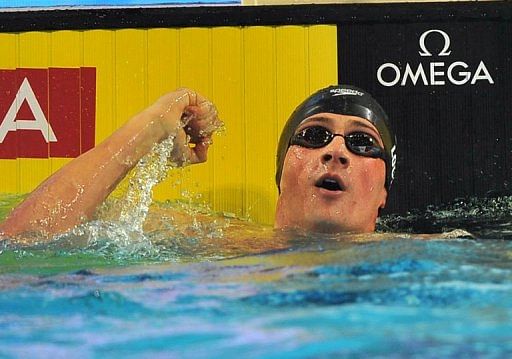USA&#039;s Ryan Lochte competes in the men&#039;s 100m individual medley semi-finals