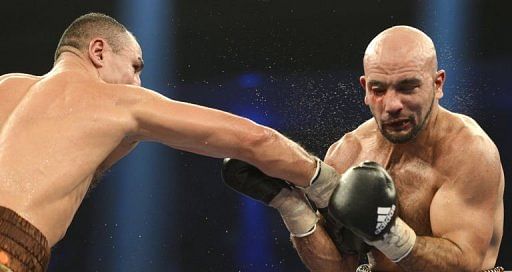 Armenian-German super middleweight boxer Arthur Abraham (L) punches French challenger Mehdi Bouadla on December 15, 2012