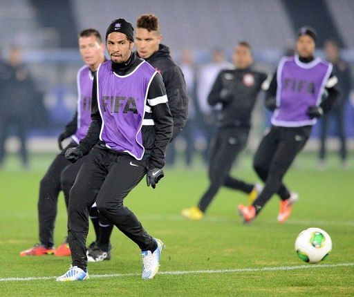 Corinthians defender Wallace (front) takes part in a team training session in Yokohama on December 15, 2012