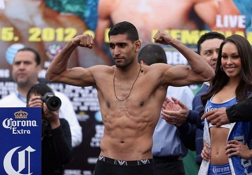Amir Khan, seen here on the eve of his WBC light-welterweight title fight against Carlos Molina, on December 14, 2012