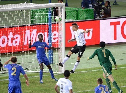 Corinthians forward Paolo Guerrero heads in against Chelsea in the Club World Cup final on December 16, 2012 in Japan