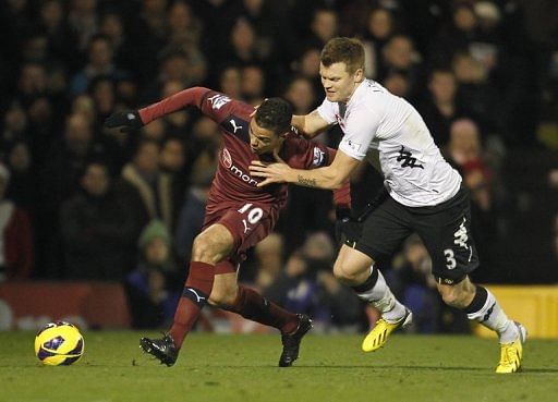 Newcastle United&#039;s French midfielder Hatem Ben Arfa (left) at Craven Cottage stadium in London on December 10, 2012.