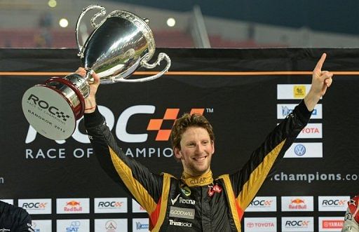 French F1 driver Romain Grosjean celebrates after winning the Race of Champions in Bangkok on December 16, 2012