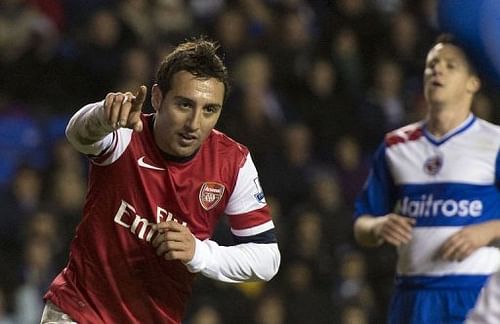 Arsenal's Spanish midfielder Santi Cazorla (R) celebrates scoring his third goal against Reading Arsenal's Spanish midfielder Santi Cazorla (R) celebrates scoring his third goal against Reading