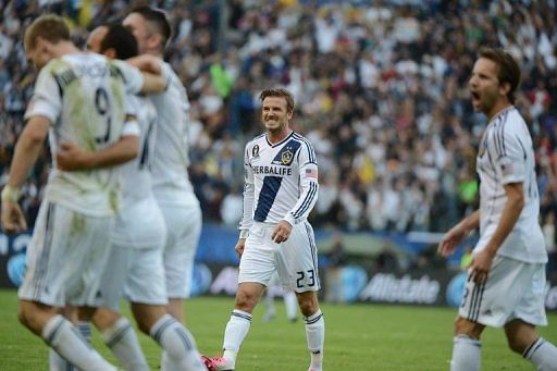 David Beckham and other members of the Los Angeles Galaxy celebrate a goal on December 1, 2012