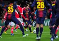 Barcelona's Lionel Messi controls the ball during their Champions League match against Benfica, on December 5, 2012