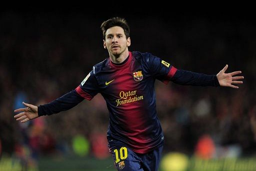 Barcelona forward Lionel Messi celebrates after scoring against Atletico de Madrid on December 16