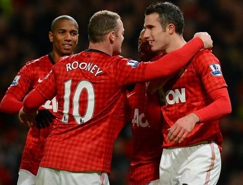 Man United's Wayne Rooney (C) and Robin van Persie (R) at Old Trafford on December 15, 2012. Man United's Wayne Rooney (C) and Robin van Persie (R) at Old Trafford on December 15, 2012.