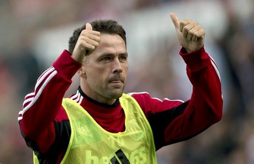 Stoke City&#039;s Michael Owen gestures from the sidelines during a match against Manchester City on September 15, 2012