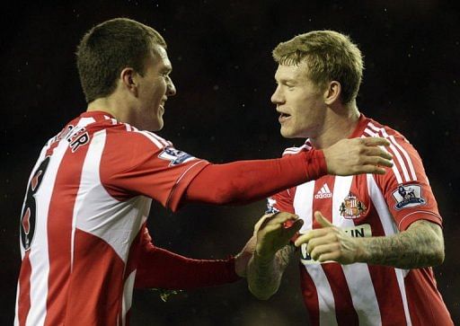 Sunderland&#039;s Craig Gardner (L) and James McClean (R) celebrate at The Stadium of Light on December 26, 2012
