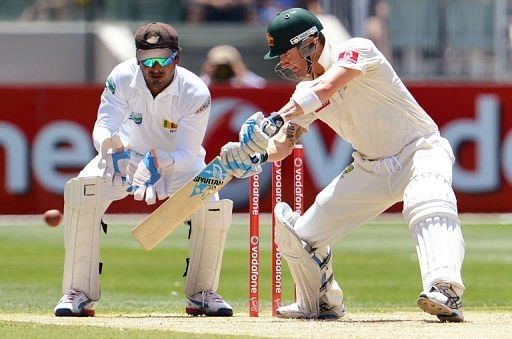 Michael Clarke cuts a ball on the way to scoring his century on the second day of the second Test on December 27, 2012