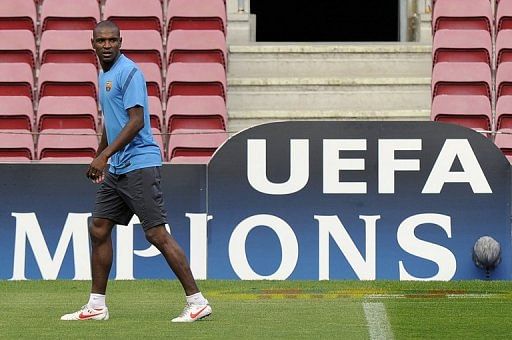 Eric Abidal takes part in a training session at the Camp Nou stadium in Barcelona on April 2, 2012 in Barcelona