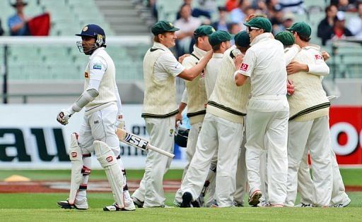 Sri Lanka&#039;s batsman Mahela Jayawardene walks off after been dismissed by Australia, in Melbourne, on December 28, 2012