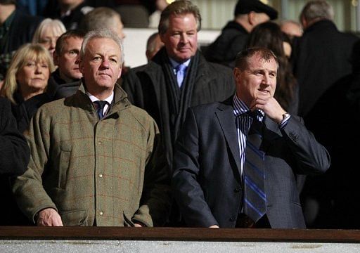 Paul Jewell (R) before a match against Arsenal at Portman Road, on January 12, 2011
