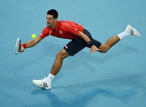 Novak Djokovic reaches for a forehand at the China Open in Beijing on October 2, 2012