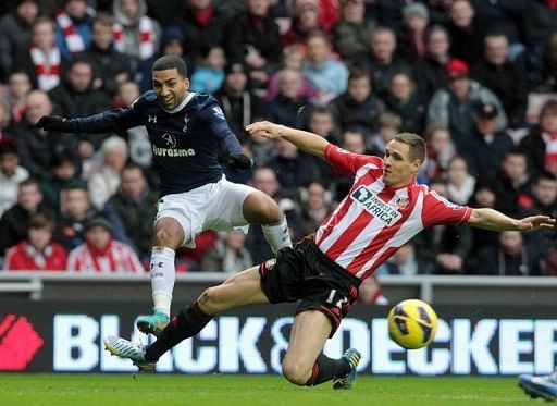 Sunderland&#039;s Matthew Kilgallon (R) tackles Tottenham&#039;s Aaron Lennon at The Stadium of Light on December 29, 2012