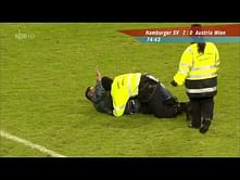 Video: Awesome pitch invader dribbles and dodges stewards