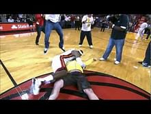 Video: LeBron tackles Heat fan who hits $75,000 shot!