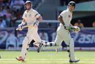 Australian batsmen Ricky Ponting (R) and
