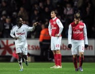 Swansea City's Nathan Dyer (L) gestures