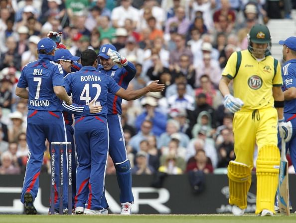 England's Ravi Bopara (3rd R) celebrates