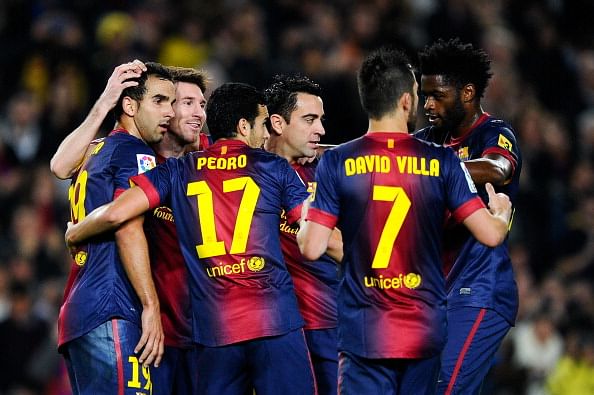 BARCELONA, SPAIN - NOVEMBER 17:  Lionel Messi of FC Barcelona (2ndL) celebrates with his teammates after scoring his team&#039;s third goal during the La Liga match between FC Barcelona and Real Zaragoza at Camp Nou on November 17, 2012 in Barcelona, Spain. FC Barcelona won 3-1.  