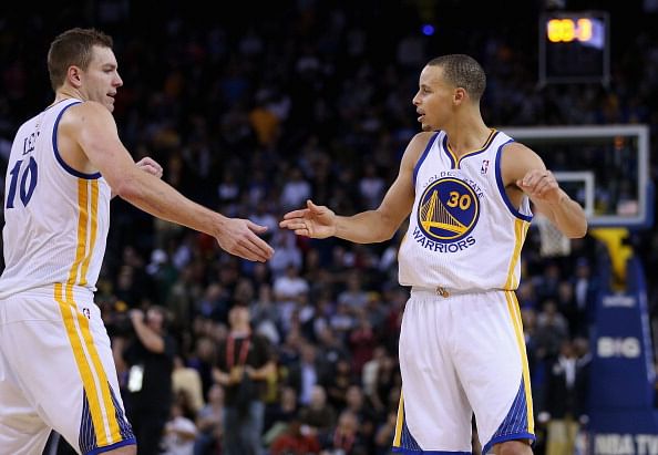 Stephen Curry #30 and David Lee #10 could use Bogut&#039;s help on the defensive front. 