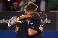 Novak Djokovic and Stanislas Wawrinka after their marathon 4th-rounder