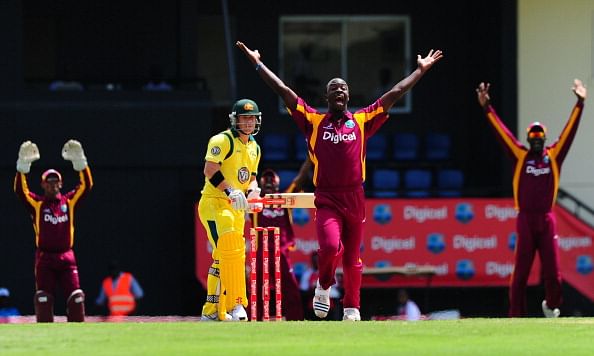 West Indies cricketer Kemar Roach (C) pr