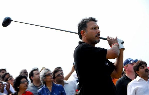 Indian golfer Jeev Milkha Singh tees off