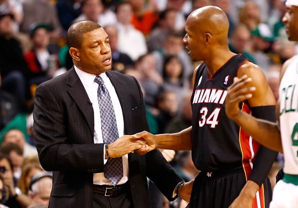 BOSTON, MA - JANUARY 27: Head coach Doc Rivers of the Boston Celtics and Ray Allen #34 of the Miami Heat greet each other during the game