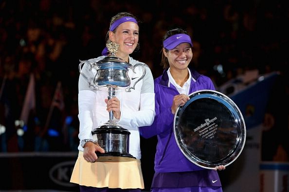 MELBOURNE, AUSTRALIA - JANUARY 26:  Victoria Azarenka (L) of Belarus poses with the Daphne Akhurst Memorial Cup and Na Li of China with the runners up trophy after their women&#039;s final match 