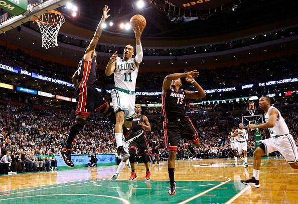 BOSTON, MA - JANUARY 27: Courtney Lee #11 of the Boston Celtics goes up for a layup against the Miami Heat