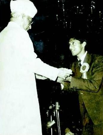 PREZ AND THE PRIZE: Receiving the Arjuna Award from former President Radhakrishnan in New Delhi in 1963