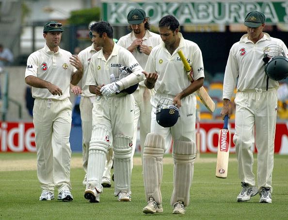 India's batsmen Laxman (2nd-R) and Rahul